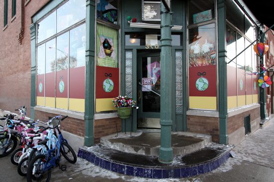 A bicycle parked in front of a building.