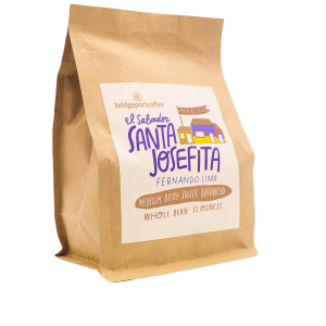 A bag of coffee is shown on the side.
