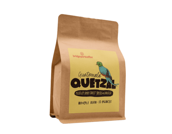 A bag of coffee beans with a bird on it.